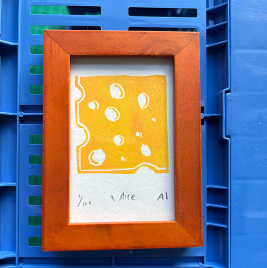 Framed slice of cheese #1